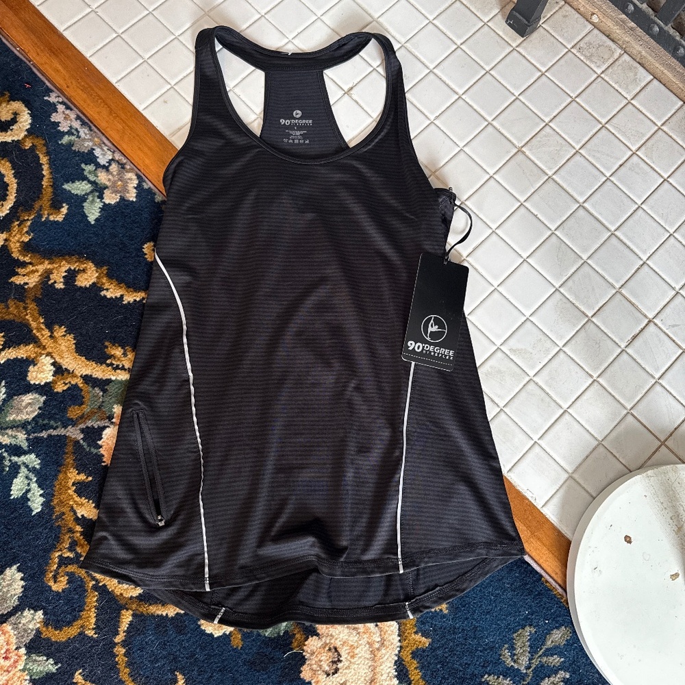 90 Degree T back running top‎ with zippered pocket. NWT. Retail 54